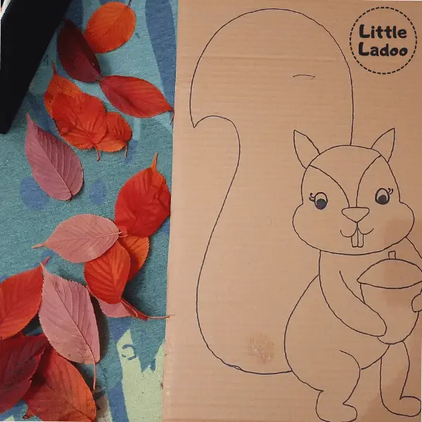 fall leaves and cardboard squirrel