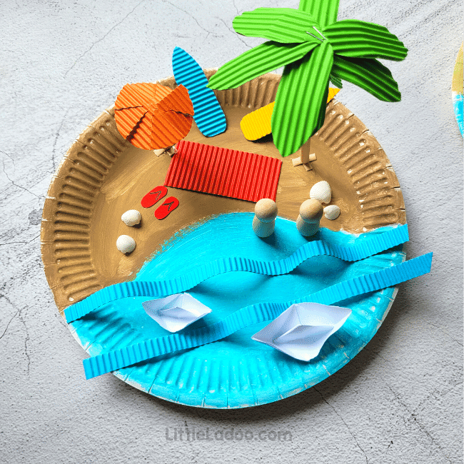 https://www.littleladoo.com/wp-content/uploads/2023/07/Paper-plate-Beach-Craft-1.png