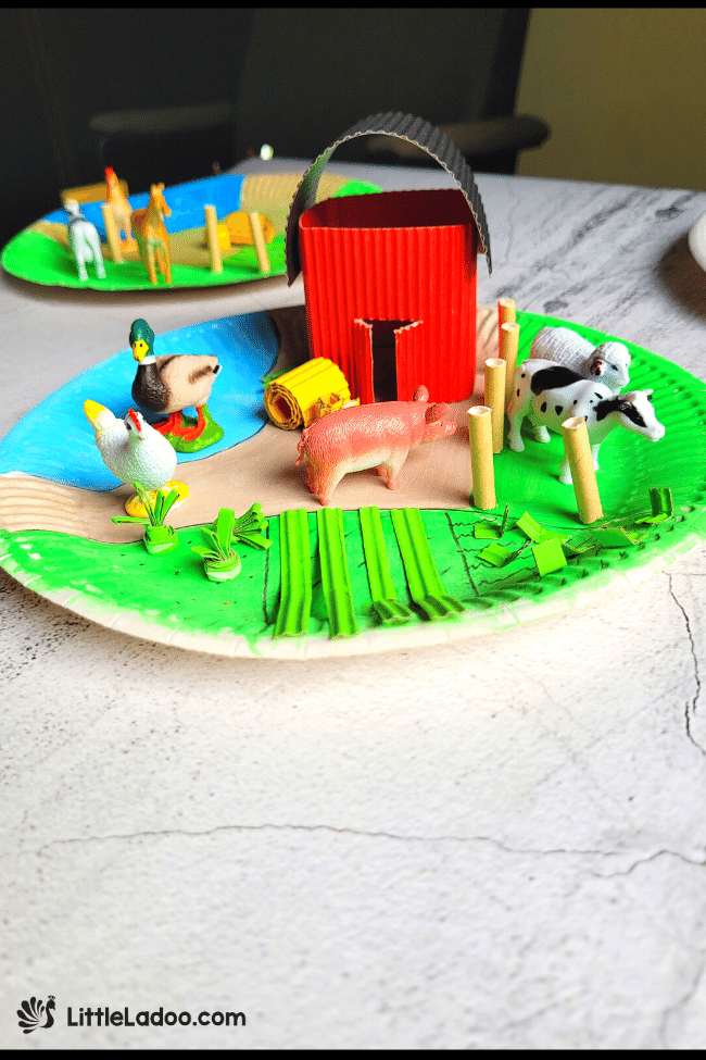 Farm craft with barns, animals, etc. made from paper plate