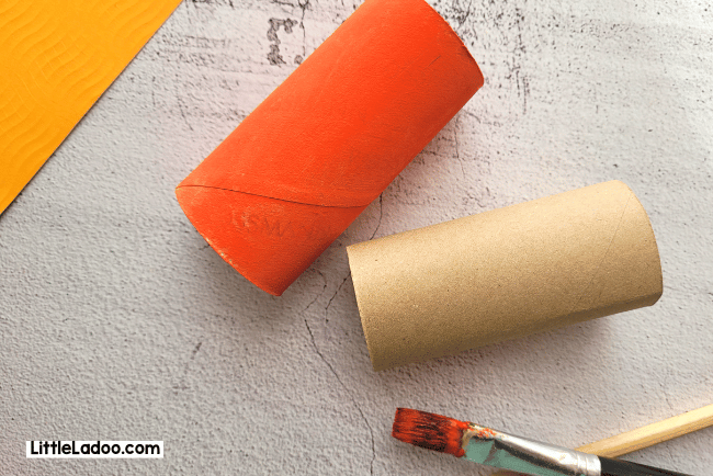 Paint the toilet paper roll Orange