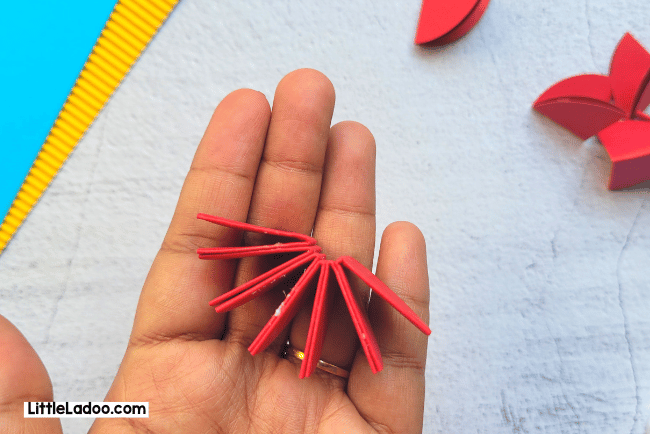 Body of 3D Diya craft made from folded paper and stuck with glue
