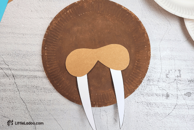 Sticking the Walrus features on the Paper plate