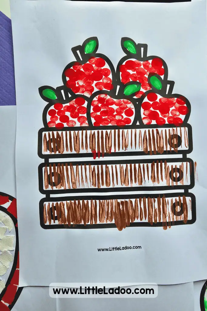 Finger painting apple in basket craft